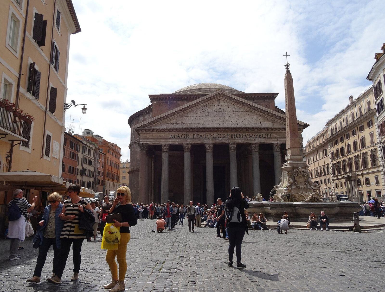 Pantheon portico, pediment, and dome from Piazza della Rotonda, day, pale blue sky