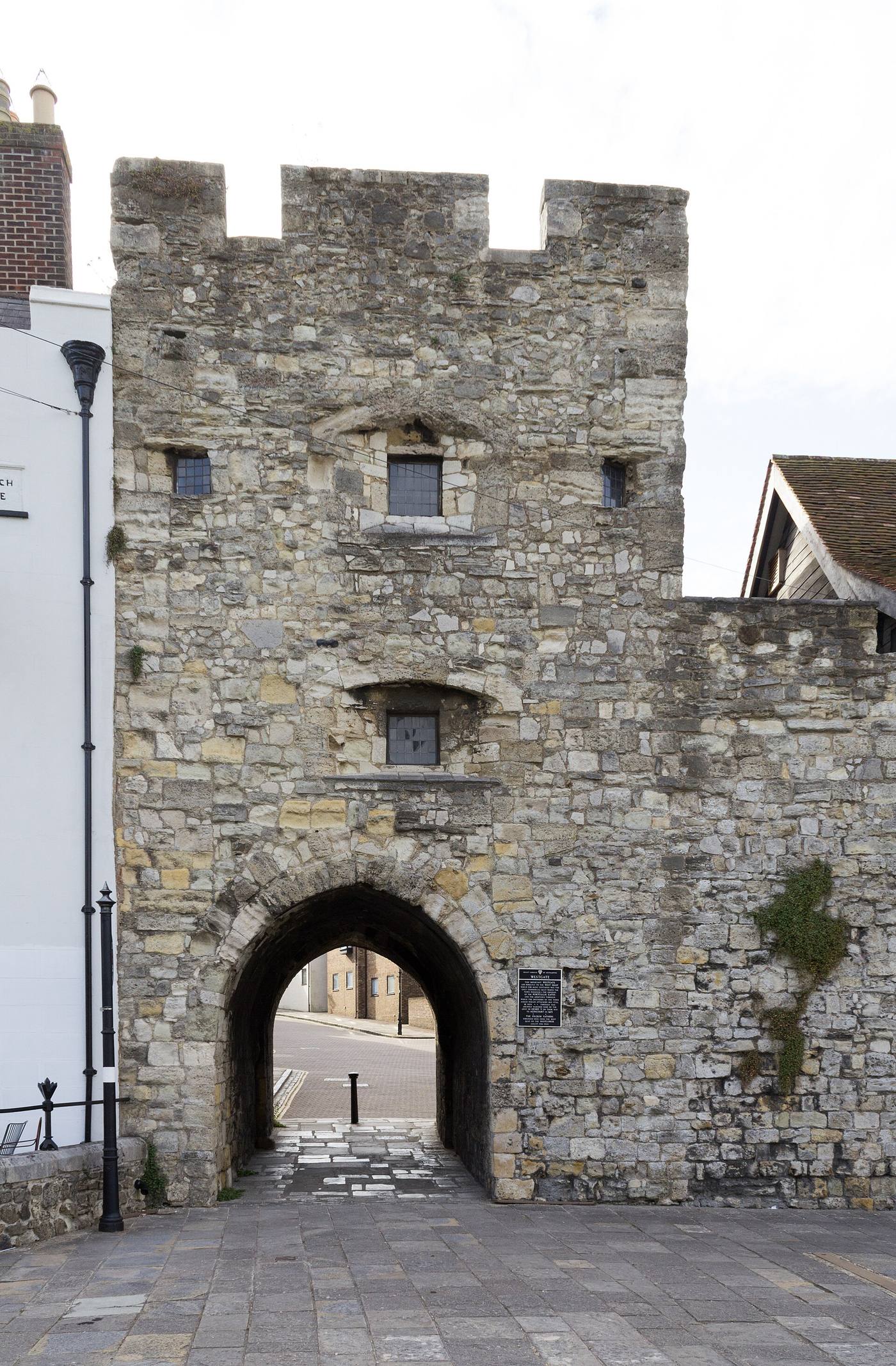 Westgate — walk the walls from here down to the old quayside vaults.
